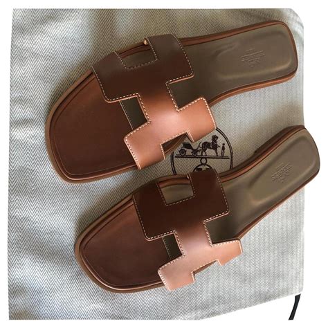 hermes sandalen oran braun|Hermes oran sandals celebrities.